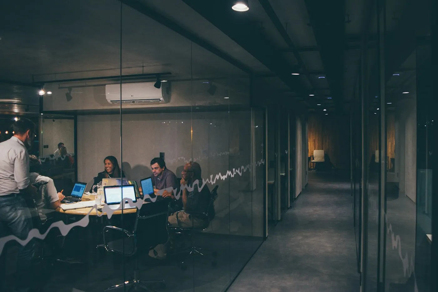 Colleagues meeting around a table